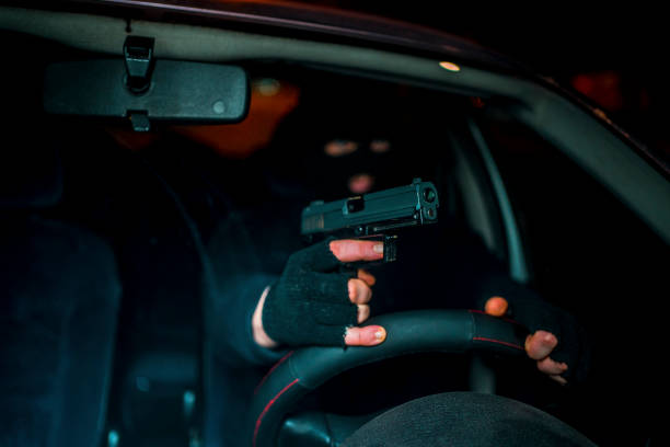 istock Gangster in the car 1307645667