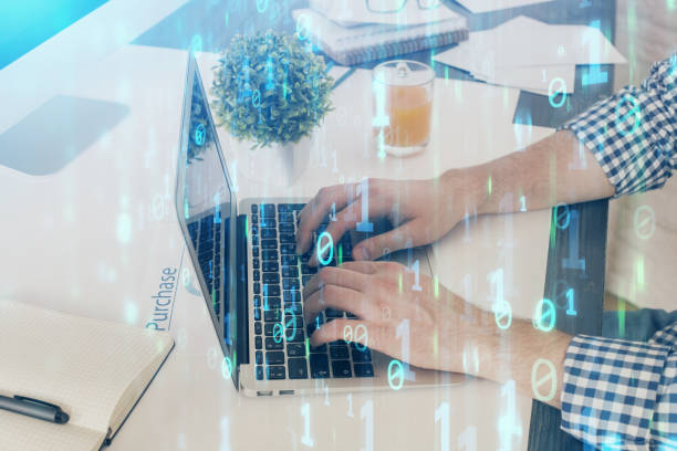 istock Multi exposure of tech drawings with man working on computer background. Concept of innovation. 1307648005