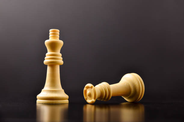 istock Gender violence concept represented with chess pieces dark 1307652313