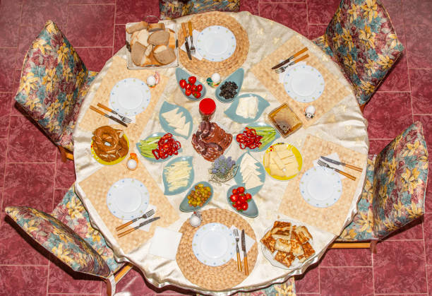 istock Delicious rich Traditional Turkish breakfast include tomatoes, cucumbers, cheese, butter, eggs, honey, bread, bagels, olives and tea cups. Ramadan Suhoor aka Sahur. 1307655105