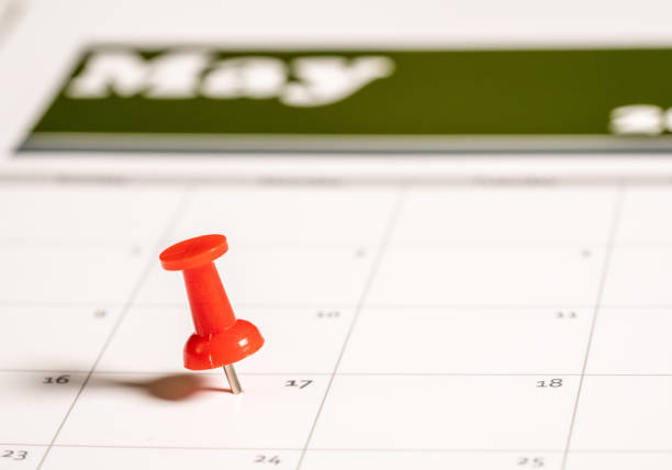 istock Tax Day concept for May 17 2021 using calendar and push pin 1307662624