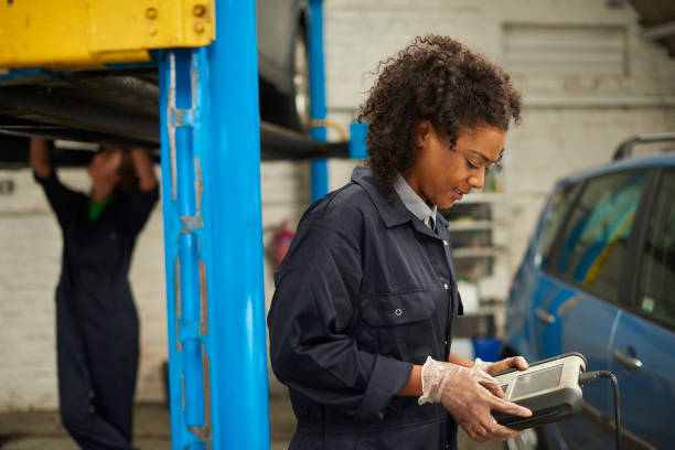 istock female mechanic portrait 1307664919