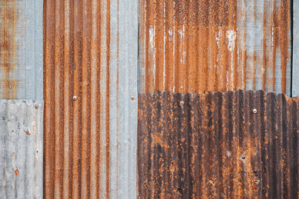 istock An old rusty metal sheet roof textured. 1307669875
