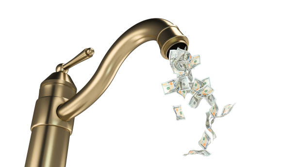 istock money tap with us paper currency,3d render 1307675003