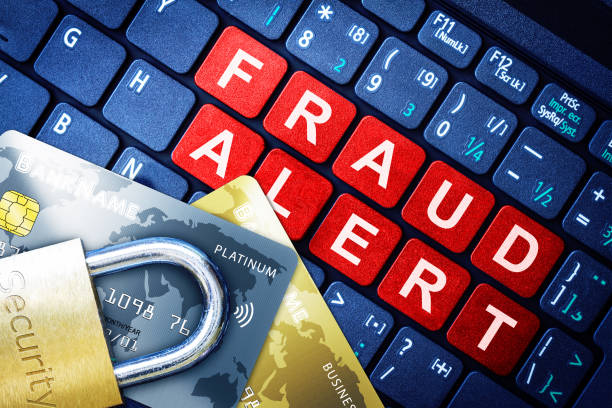 Fraud Alert Concept With Security Lock on Fake Credit Cards stock photo