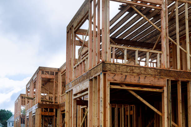 istock Framing beam of new house under construction home framing 1307675780