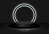 istock Black Friday Sale Concept. Circle black podium, decoration with neon light white round design on dark background. Stage empty for decor for Product, Advertising, Show, Award. Vector illustration. 1307676560