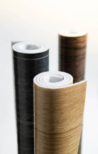 istock Linoleum. Three rolls of linoleum on a white background. 1307676591