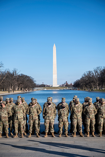 Washington DC, USA - January 22, 2021: Members of the Kentucky National Guard, sent to Washington DC to provide security, visit the Reflecting Pool and Lincoln Memorial during some time off.