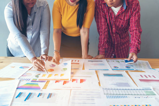 istock Business strategy team report chart, graph, infographic data analyze financial report plan. Hands team partner planning marketing finance statistics sale report with excel spreadsheet accountting 1307677415