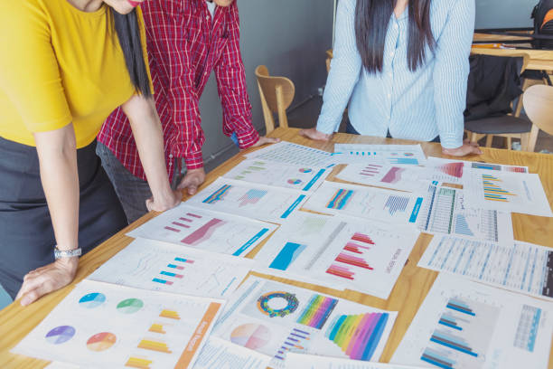 istock Business strategy team report chart, graph, infographic data analyze financial report plan. Hands team partner planning marketing finance statistics sale report with excel spreadsheet accountting 1307677422