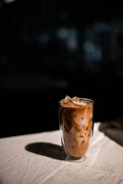 istock Glass of coffee on the table 1307680519