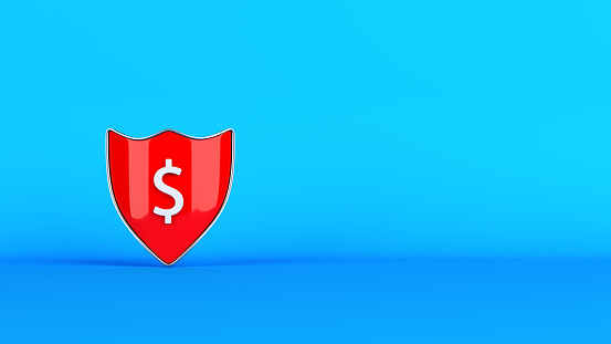 Finance concept Red-colored shield and white-colored dollar symbol On blue-colored background Horizontal composition with copy space