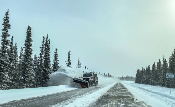istock Snow Plow Clearing Alaskan Highway 1307686107