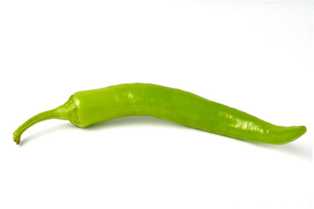 istock Fresh ripe green hot pepper isolated on white 1307689079