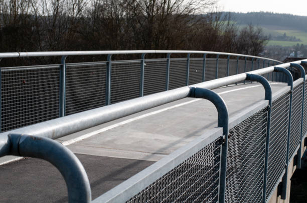 istock a concrete footbridge with a metal railing 1307689842
