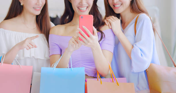 istock women looking content on smartphone 1307691547