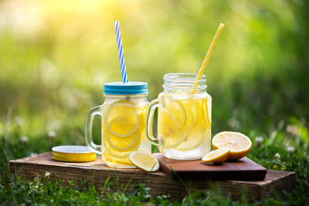 istock refreshing cold lemonade in a jar on a sunny meadow 1307691554