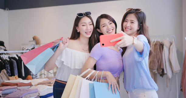 istock women take selfie by smartphone 1307691561