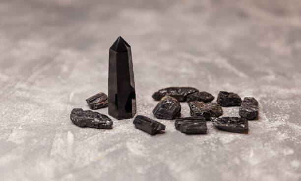 black obsidian crystal wand. crystals of stone black tourmaline. - reiki alternative medicine chakra recovery imagens e fotografias de stock