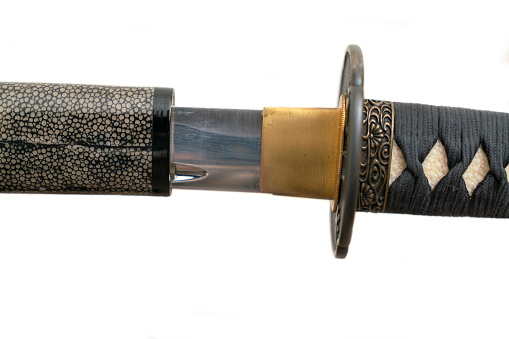Traditional dagger of the Arabian peninsula, worn by men for ceremonial occasions with an ornate belt - short double-sided curved blade - ornate scabbard and hilt - janbiya / khanjar