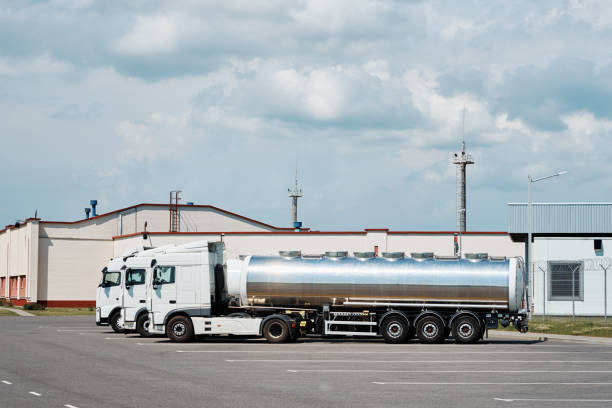 istock Trucks with tank trailer on parking lot 1307696385
