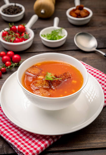 istock Homemade tomato soup with tomatoes, herbs and spices 1307700908