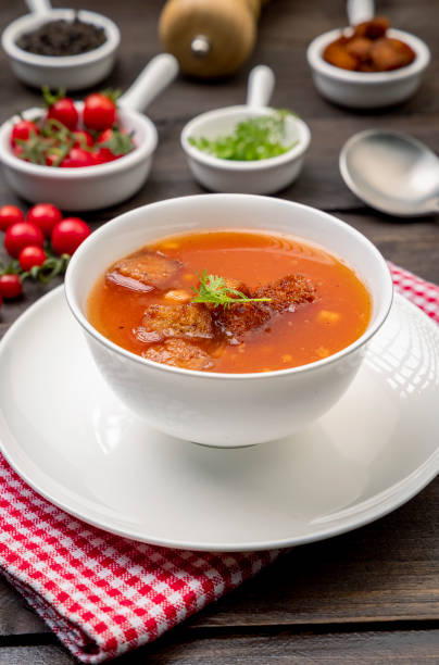 istock Homemade tomato soup with tomatoes, herbs and spices 1307700939