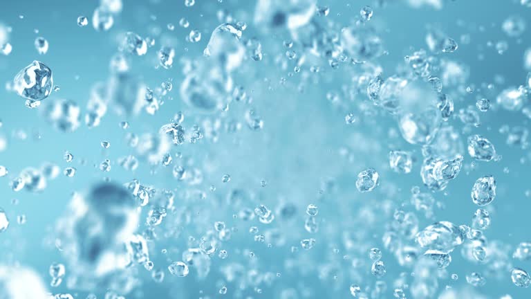 Water drops flying in super slow motion 4K