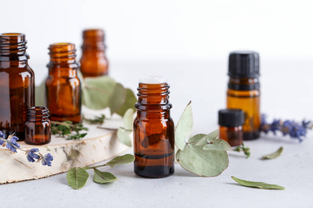istock Collection of various essential oils with different herbal ingredients 1307709554