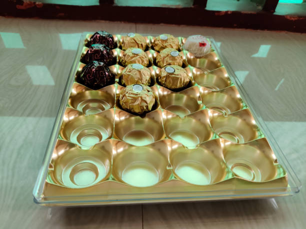 Sweet chocolates with golden color cover