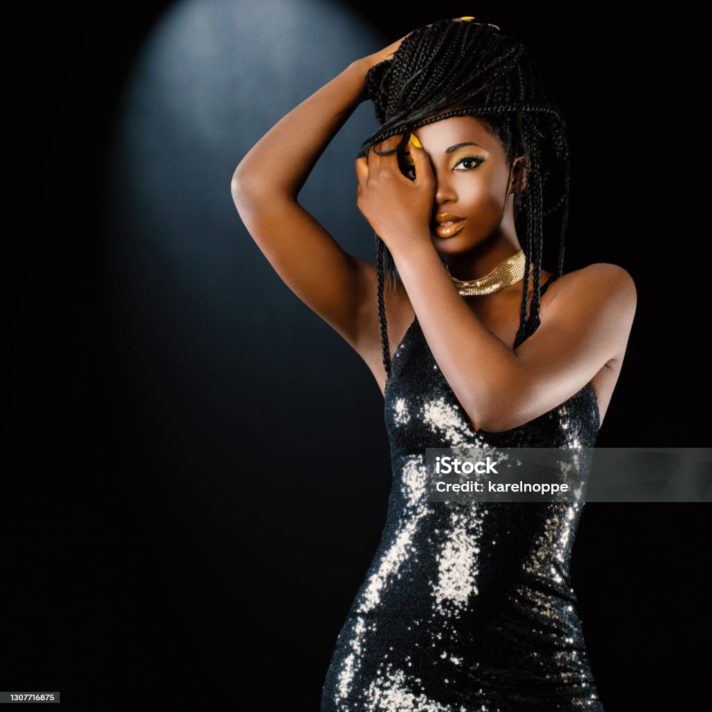Elegant African Woman With Party Dress And Braided Hairstyle Stock Photo -  Download Image Now - iStock