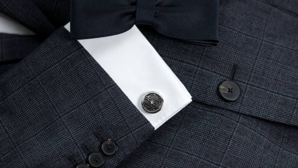 istock Luxury bow tie close up with vintage suit and cufflink. 1307721024