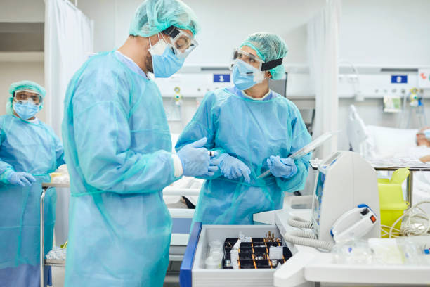 istock Doctors looking at samples in hospital ward 1307721732