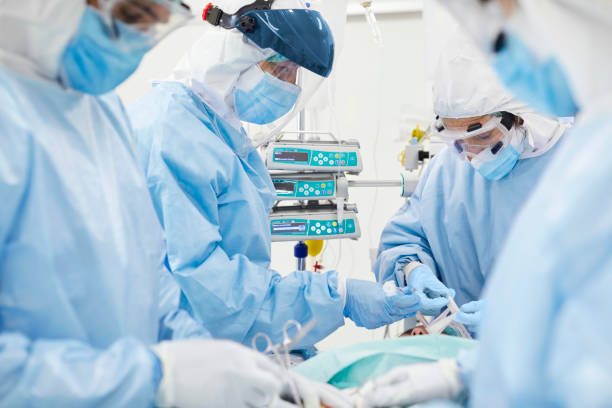 istock Doctors operating in ICU during COVID-19 outbreak 1307721800