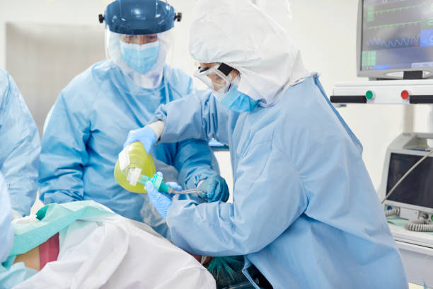 istock Doctors intubating patient in ICU during COVID-19 1307721810