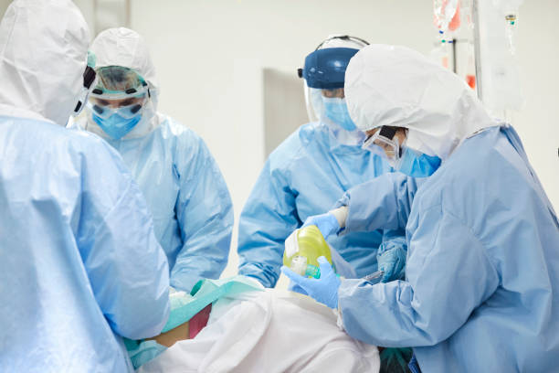 istock Surgeons intubating patient in ICU during COVID-19 1307721824