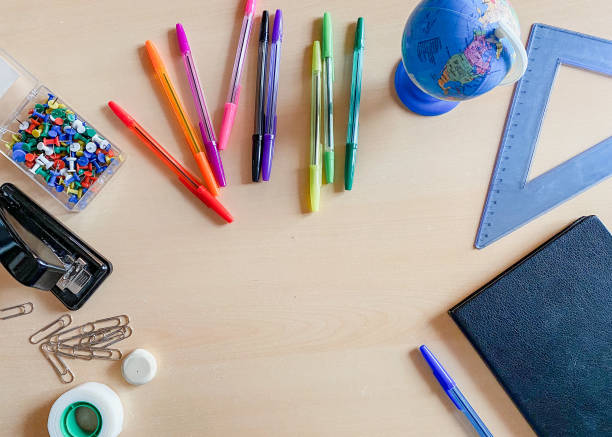 istock Background with school supplies 1307723797
