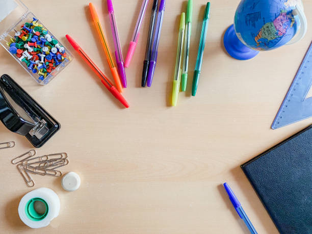 istock Background with school supplies 1307723800