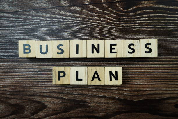 istock Business Plan Word alphabet letters on wooden background 1307724924