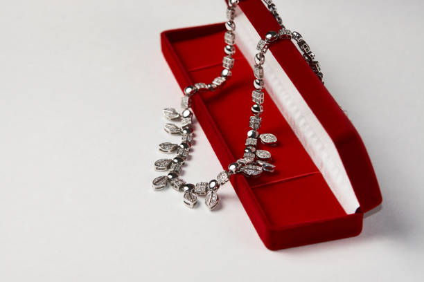 istock Elegant necklace with diamonds on white background with copy space 1307725031