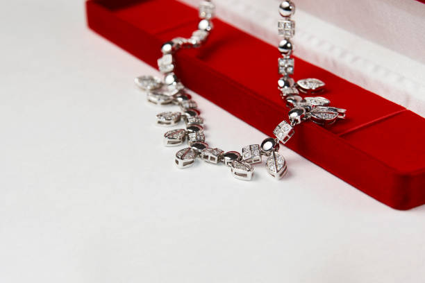 istock Elegant necklace with diamonds on white background with copy space 1307725035