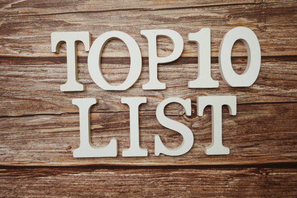 istock Top 10 List alphabet letter on wooden background 1307725395