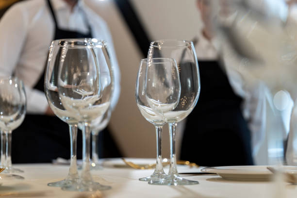 istock Chic and elegant, gold-plated cutlery and white plates, table setting with empty plates. 1307726730
