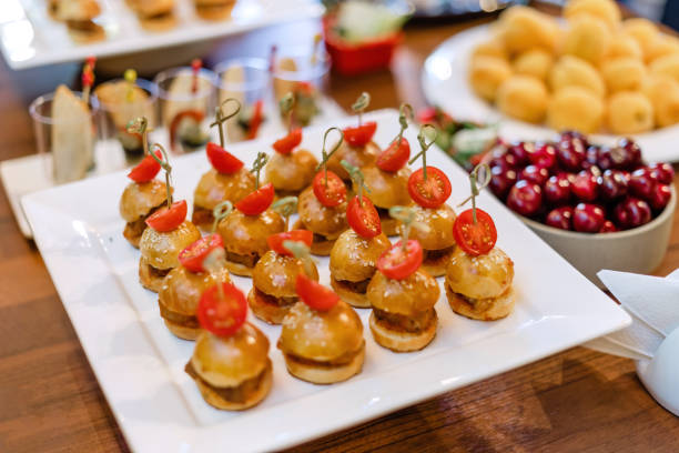 istock Mini chicken burgers on white plate. Luxury catering. 1307726774