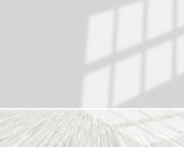 istock 3D light room interior with sun shining from the right 1307727894