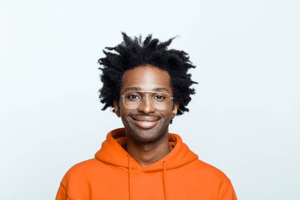 istock Cheerful man in orange hoodie 1307732163