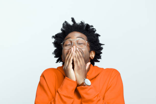 istock Grateful man in orange hoodie 1307733546