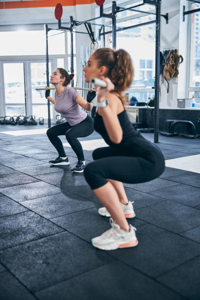 istock Athletic women working out with gymnastic sticks 1307733968