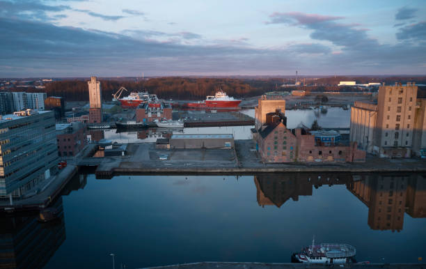 istock Old silos and warehouses along the canal 1307737116